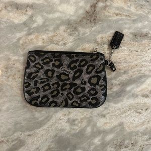 Dorable shimmery little coach clutch